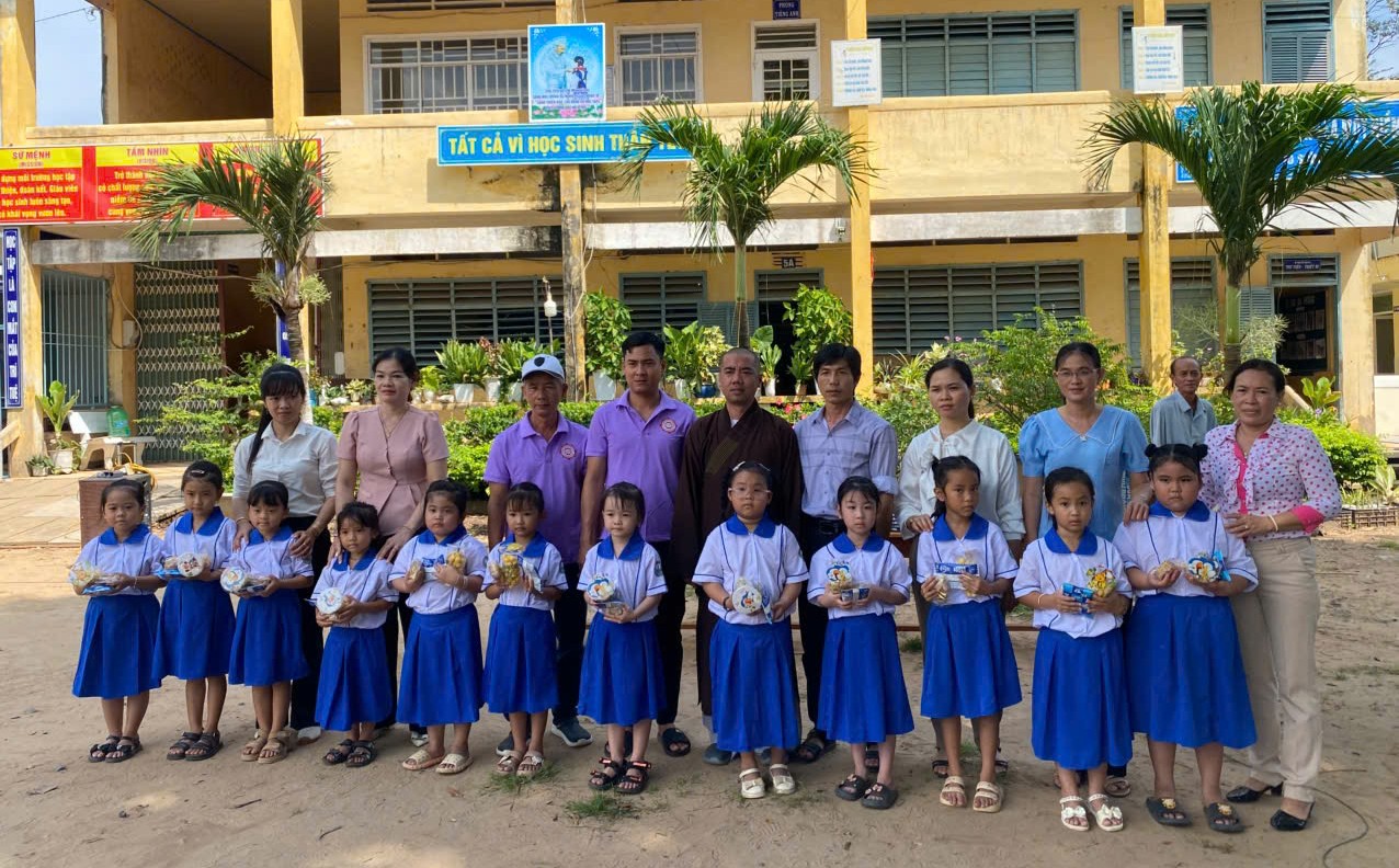 Description: A group of people posing for a photoAI-generated content may be incorrect.