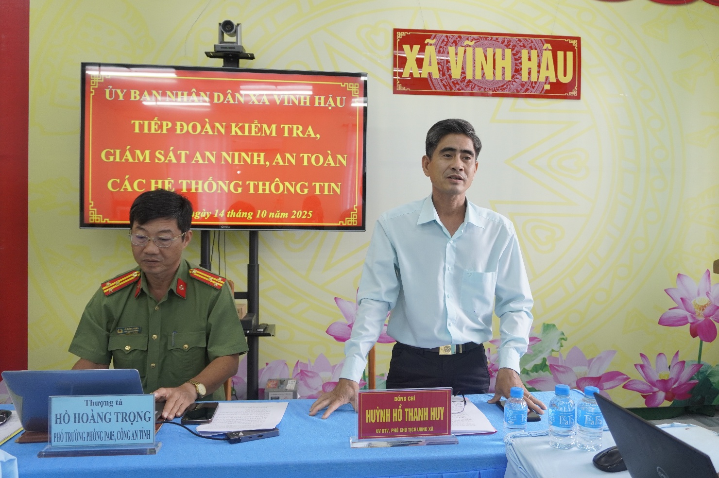 Description: A person in a uniform standing next to a person in a uniform
AI-generated content may be incorrect.