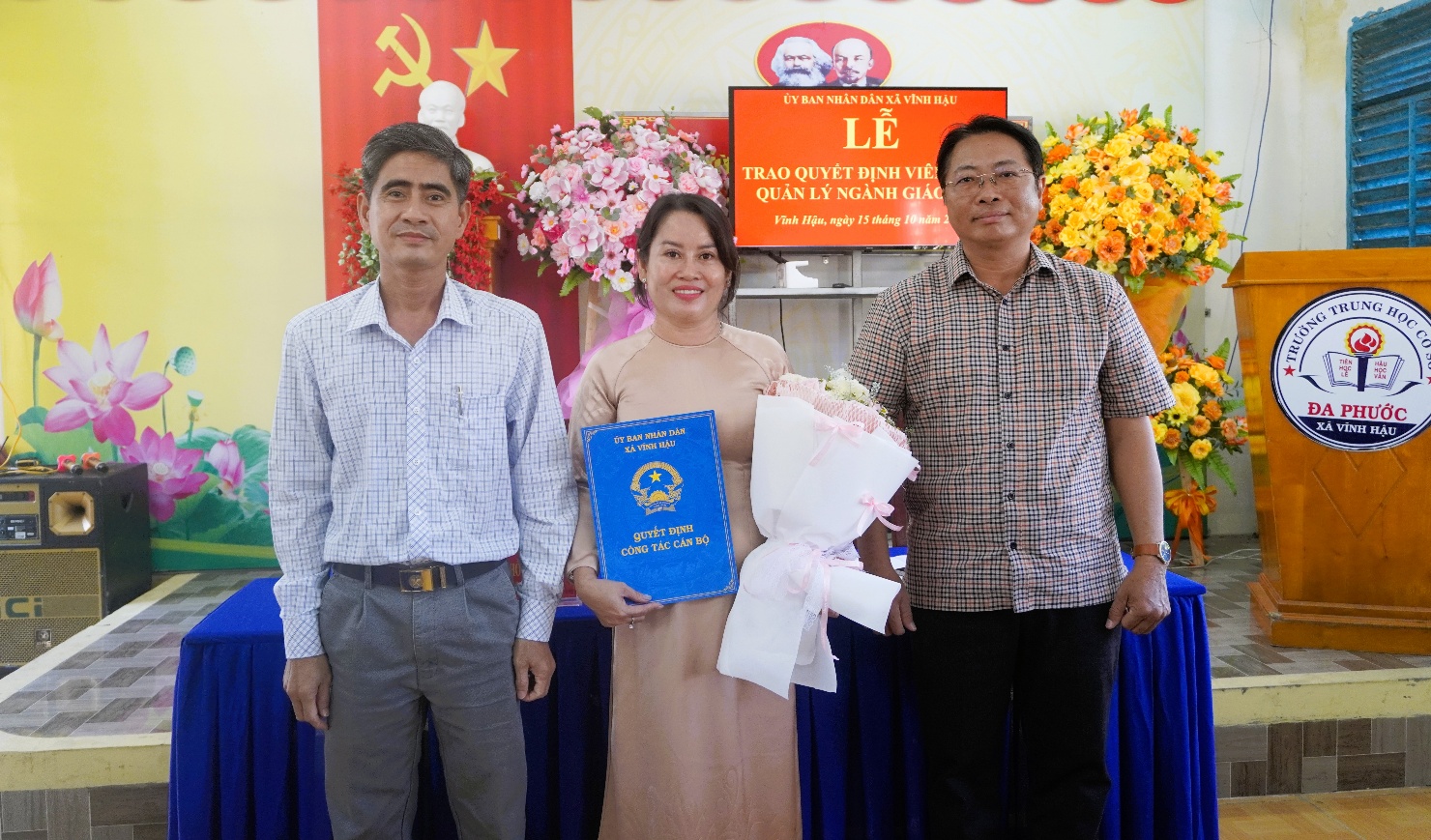 Description: A group of people posing for a photoAI-generated content may be incorrect.