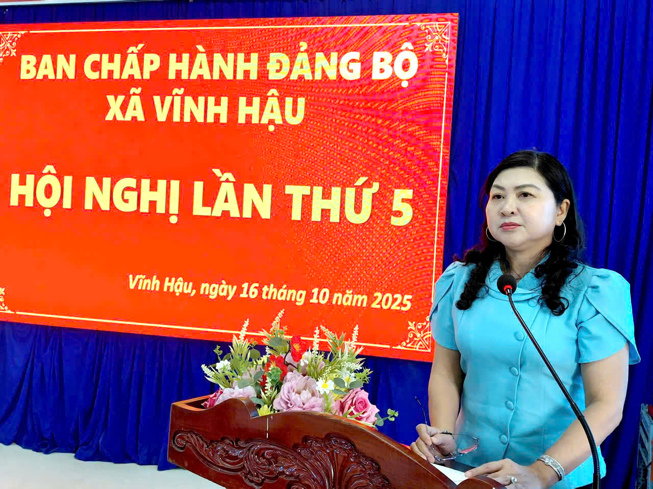 Description: A person standing in front of a signAI-generated content may be incorrect.